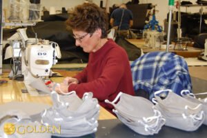 Golden employees making masks for Geisinger