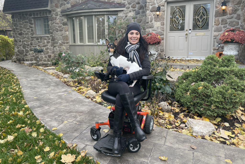 Anna Giannakouros and her dog on her Golden Technologies LiteRider Envy Power Wheelchair Firestar