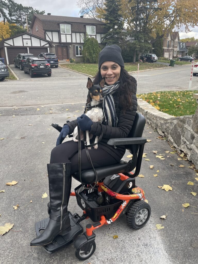 Anna Giannakouros and her dog on the Golden Technologies LiteRider Envy Power Wheelchair