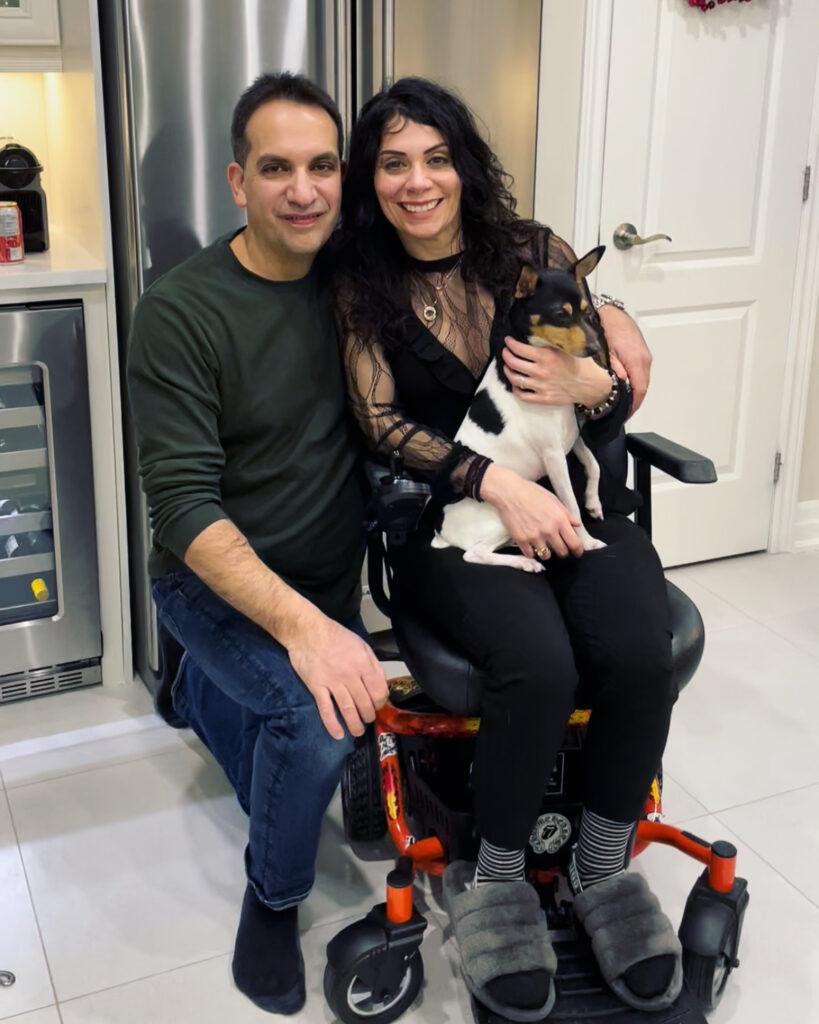 Anna Giannakouros with her husband and her dog on her Golden Technologies LiteRider Envy Power Wheelchair Firestar