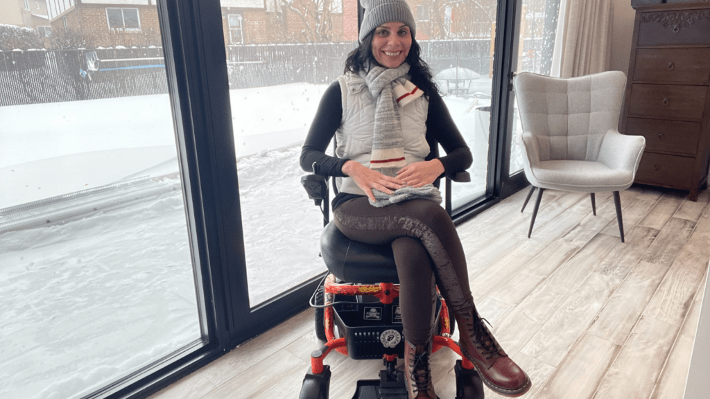 Anna Giannakourous in her Golden LiteRider Envy Power Wheelchair Firestar